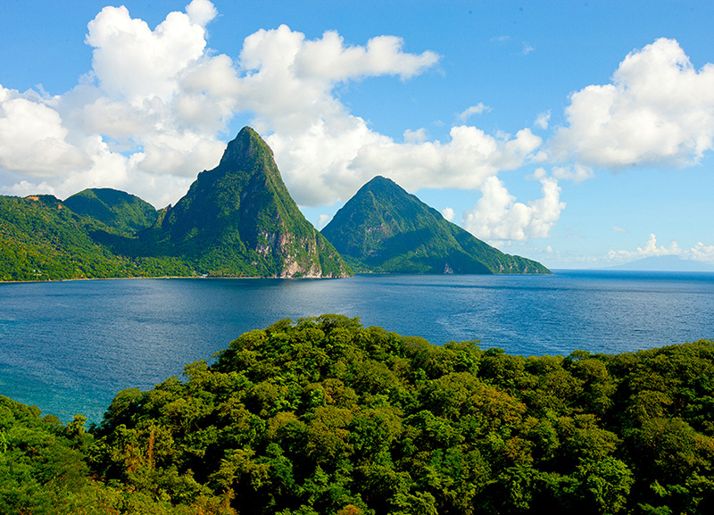 Discover the breathtaking beauty of St. Lucia's Pitons with Feel Good Water Taxi & Tours! Embark on a memorable adventure as you hike Gros Piton in Soufriere. Our private Piton Hike Tours offer an exhilarating excursion, showcasing the stunning landscapes of St. Lucia. Book your Pitons Tour now and experience the magic of these iconic peaks firsthand.
